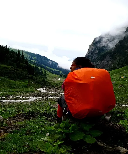 right backpack for trekking trekker sitting on a rock, How To Plan Your Next Backpacking Trip