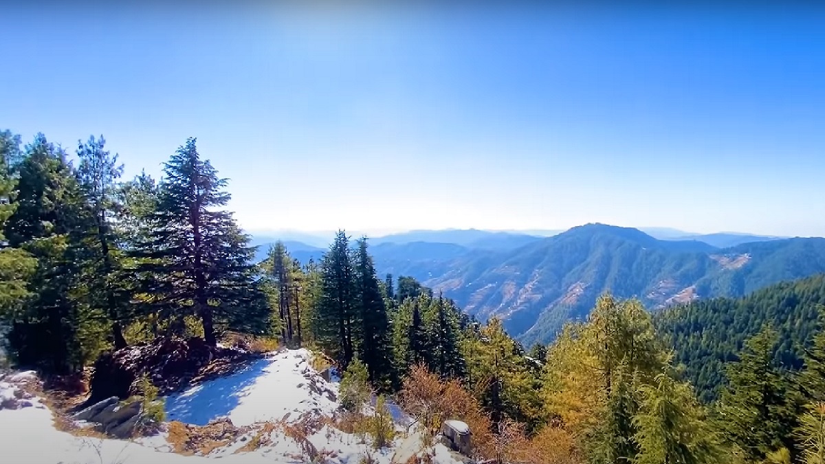 view of blue sky mountains from fagu top in shimla