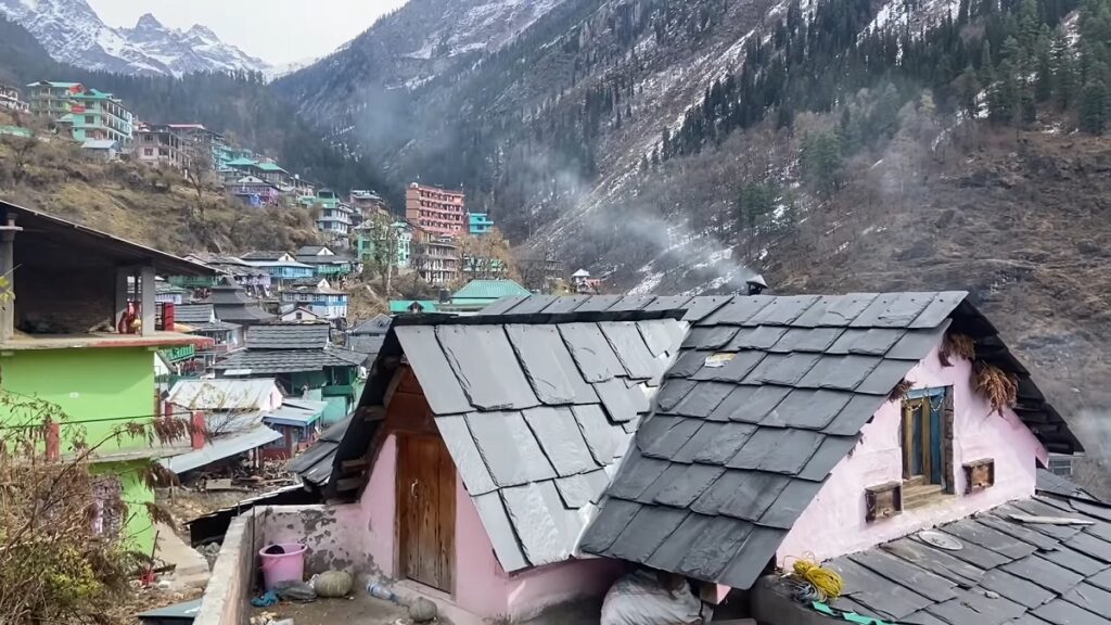 homes mountain and temple view in kutla village near kasol town in himachal