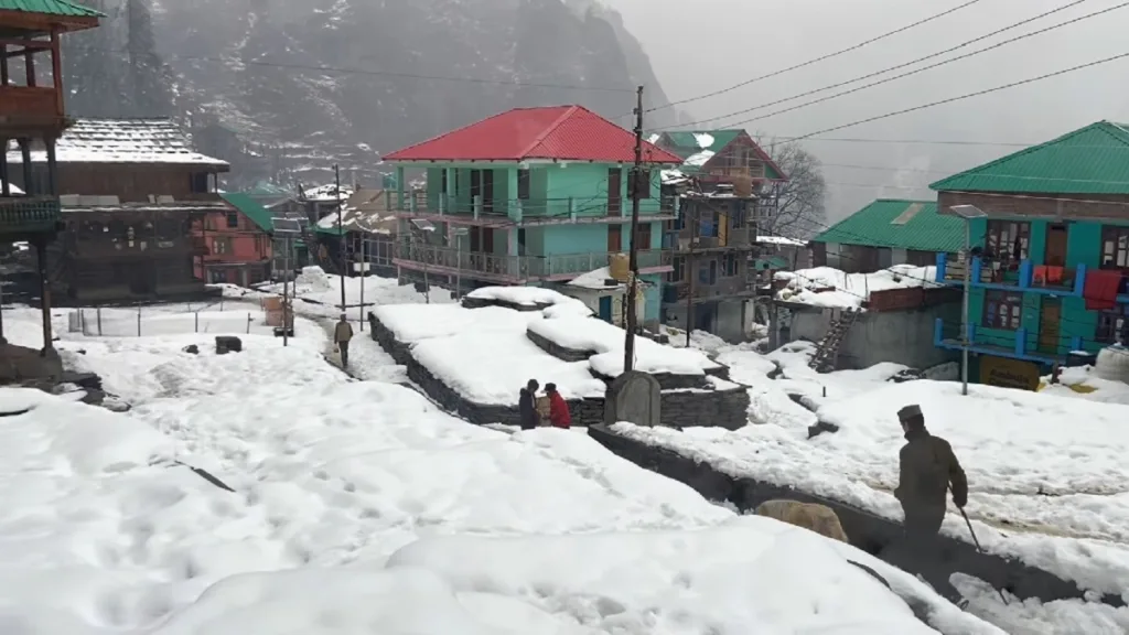 snow covered streets of malana village in winters near kasol