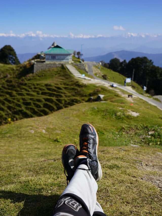 Person relaxing with a mountain view, showcasing scenic landscapes and leisure moments.