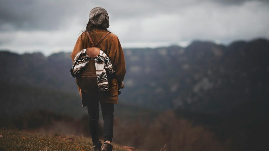 Woman exploring the mountains in Manresa, Spain, capturing the essence of wanderlust and nature.